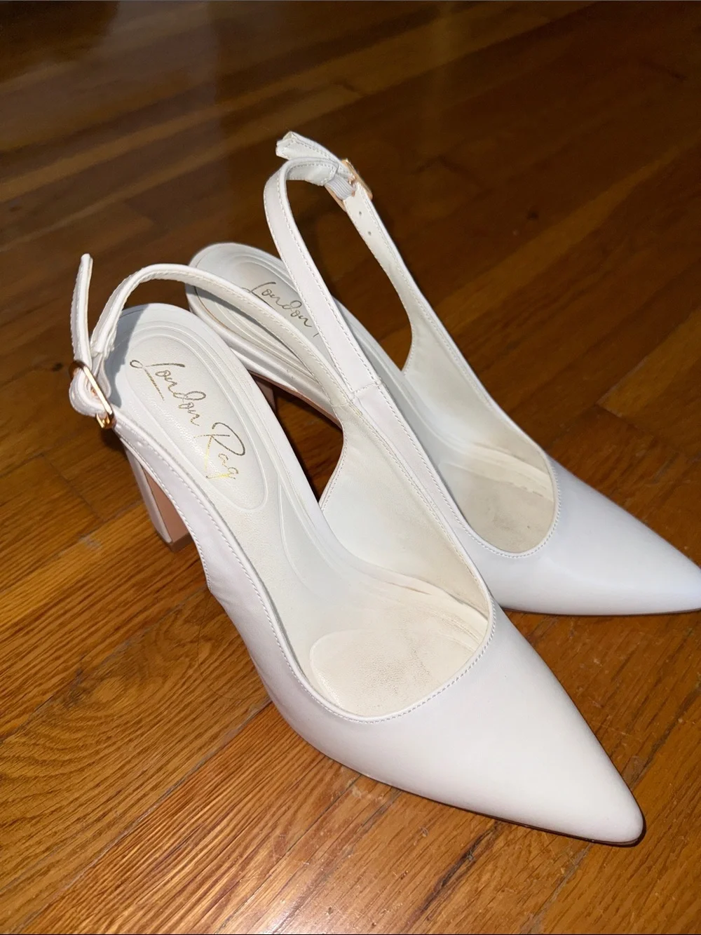 Slingback Pointed Pumps in Ivory by Andrea Rey